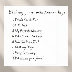 May include: A white card with black handwritten text listing birthday games with answer keys. Games include "Would She Rather," "1996 Trivia," "My Favorite Memory," "Who Knows Her Best," "How Old Was She?," "Birthday Bingo," "Emoji Pictionary," and "What's on your phone?"