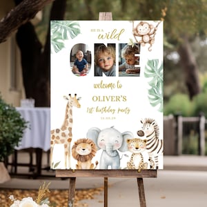 以下が含まれることがあります： 木製のイーゼルには、オリバーの1歳の誕生日パーティーのウェルカムサインが飾られています。このサインは、キリン、ライオン、ゾウ、シマウマ、ヒョウのイラストが描かれたジャングルをテーマにしています。「He is a wild ONE」というテキストが含まれています。