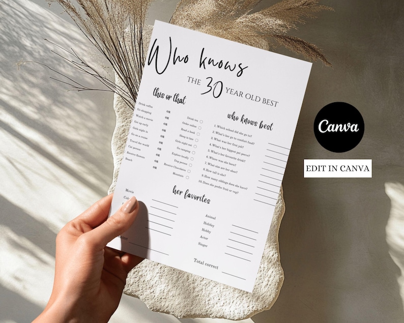 Puede incluir: Una hoja de juego imprimible en blanco y negro con el texto "Who knows the 30 year old best". La hoja incluye secciones para rellenar para "this or that" y "her favorites". El logotipo de Canva es visible.