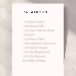May include: A white paper with the text "ANSWER KEYS" at the top. Below the title are numbered lines of text, likely answers to a quiz or test. The paper is set against a neutral background.