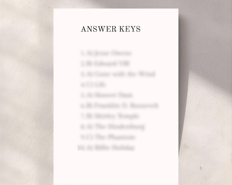 May include: A white paper with the text "ANSWER KEYS" at the top. Below the title are numbered lines of text, likely answers to a quiz or test. The paper is set against a neutral background.