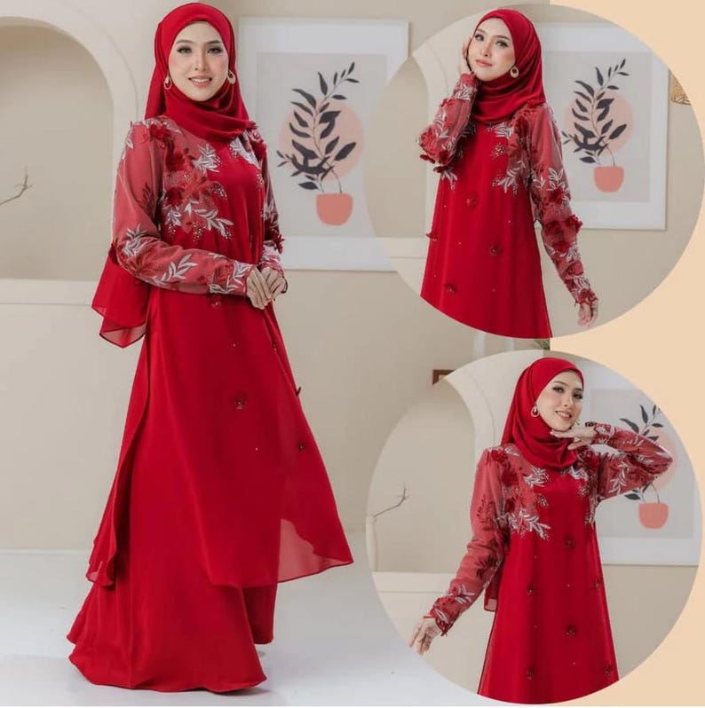 May include: A vibrant red ensemble featuring a matching hijab and a long-sleeved top with floral embroidery. The outfit includes a flowing skirt, creating a modest and elegant look. The sleeves have a sheer overlay with floral patterns.