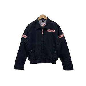 May include: Black zippered jacket with red "SIMPSON" branding on the chest and sleeves.