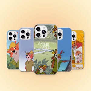 Peut inclure: Cinq coques de smartphone présentant diverses scènes et personnages du film d'animation Robin des Bois. Les motifs incluent des illustrations du renard en tunique verte et chapeau à plumes, avec une coque affichant le texte Robin Hood.