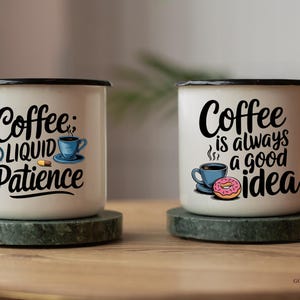 May include: Two white enamel mugs with black lettering and images. The mug on the left says "Coffee: Liquid Patience" and has a small coffee cup and a cigarette on it. The mug on the right says "Coffee is always a good idea" and has a donut and a coffee cup on it.