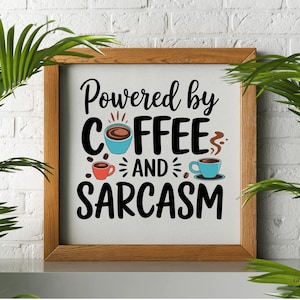 May include: A framed sign with the text "Powered by Coffee and Sarcasm" in black lettering. The sign features a blue coffee cup with steam and two smaller coffee cups, one red and one blue.
