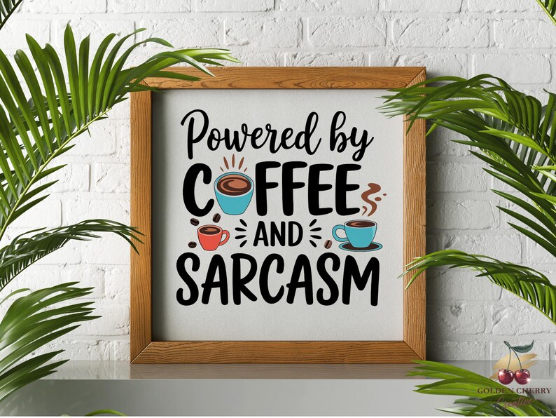 May include: A framed sign with the text "Powered by Coffee and Sarcasm" in black lettering. The sign features a blue coffee cup with steam and two smaller coffee cups, one red and one blue.