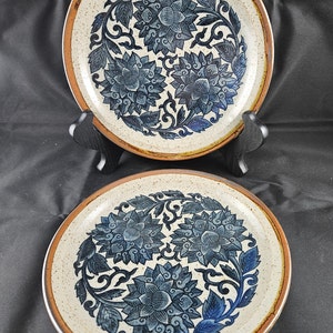 Two Stoneware small plates with blue flower design