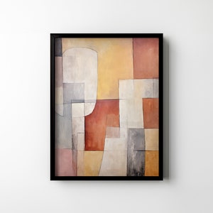 Könnte beinhalten: Abstrakter Kunstdruck in einem schwarzen Rahmen. Der Druck zeigt geometrische Formen in Grautönen, Weiß, Gelb, Orange und Rot.
