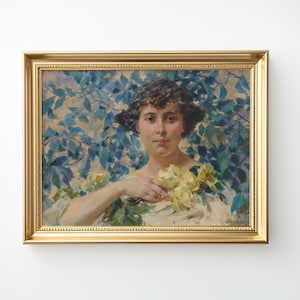 May include: A framed oil painting of a woman with dark hair and a white dress, holding a bouquet of white flowers. The background is a blurred image of blue leaves.