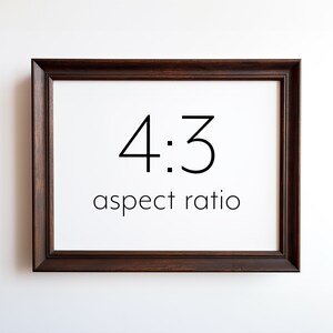 May include: A brown wooden frame with a white background and the text "4:3 aspect ratio" printed in black.