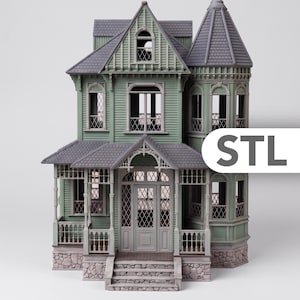 May include: A multi-story dollhouse featuring sage green siding, a dark gray shingled roof, and a stone-textured foundation. The structure includes a turret, a front porch with railings, lattice-patterned windows, and the text STL on the right side.