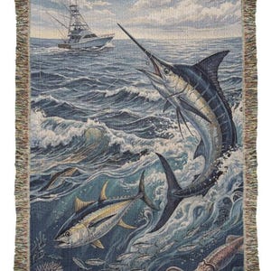 May include: Woven throw blanket featuring a marine scene with a marlin leaping from the ocean, a fishing boat, and other fish. The blanket has a fringe border and depicts a vibrant underwater world.