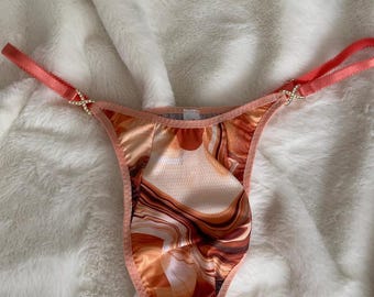 Slip da uomo, slip da uomo con motivi astratti, slip da uomo in rete fine, slip da uomo per l'estate