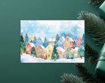 May include: A watercolor painting of a snowy village with colorful houses and trees. The houses are decorated with snow and have windows and doors. The trees are covered in snow and have branches reaching up to the sky. The sky is a light blue with white clouds and snowflakes falling.