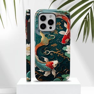 May include: A phone case with a design of two koi fish swimming in a blue and green water pattern. The fish are red, orange, and gold with black outlines. The background is a dark green with gold accents.