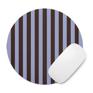 May include: A round mousepad with a vertical striped pattern in brown and light blue. A white wireless mouse is positioned on the right side of the mousepad. The mousepad is designed for computer use.