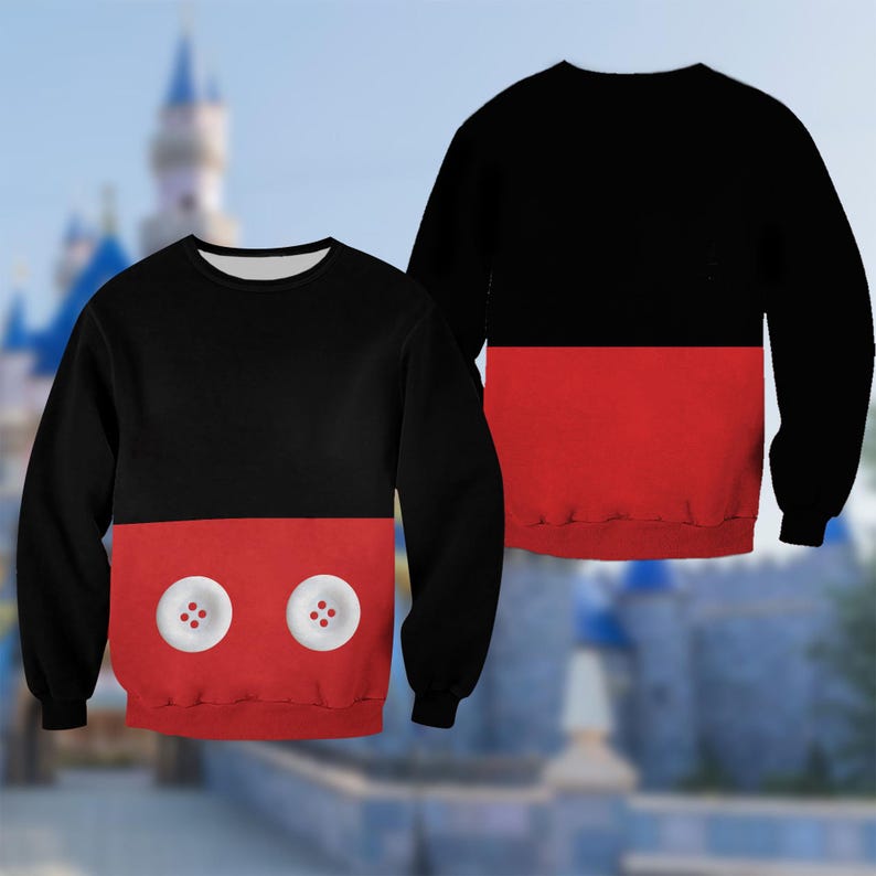A black and red sweater with a Mickey Mouse design on the front, featuring two white buttons.