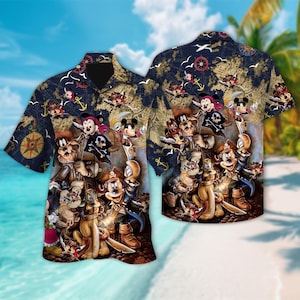 May include: A blue and white Hawaiian shirt with a cartoon pirate Mickey Mouse and friends design. The shirt features a map with a compass, anchors, and seagulls.