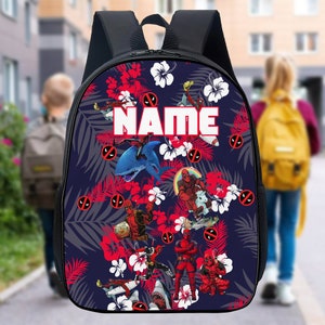 May include: A blue backpack with a tropical print featuring red and white flowers, palm leaves, and a variety of Deadpool characters. The backpack has a black zipper and a white text overlay that says "NAME".