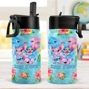 May include: Two water bottles with black lids and handles. The bottles feature a light blue background with cartoon characters and floral accents. The text "ZOEY OBAR" is printed on the front of each bottle.