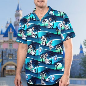 May include: A blue and green short-sleeved button-up shirt with a repeating pattern of Olaf from Frozen riding a surfboard in front of palm trees.