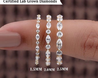 May include: Three gold rings featuring Certified Lab Grown Diamonds in marquise and round cuts. The rings are labeled with widths of 1.5mm, 2.0mm, and 2.5mm, showcasing varying stone sizes arranged in an alternating pattern along the thin metal bands.