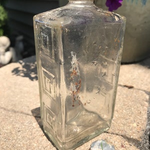 1930s Clear Glass Embossed Perfume Bottle with Cap