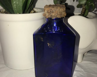 cobalt blue squibb medicine bottle still sealed