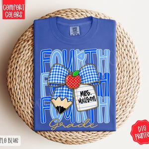 May include: A blue t-shirt featuring the text "FOURTH GRADE" in a layered blue font. The graphic includes a blue and white gingham bow, a red apple with white dots, a yellow pencil tip, and a white lined paper tag with the text "MRS. WILSON".