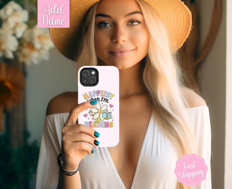May include: White phone case with a colorful graphic that says "Happiest when I'm reading" with a daisy and books.