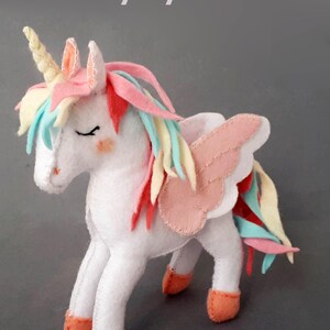 The finished unicorn toy staying on itself