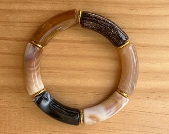 Bracciale tubolare marron perles en résine