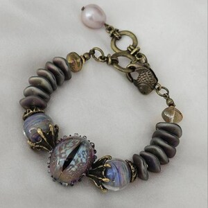 Handcrafted Gothic Snake Eye Bracelet - Artisan Lampwork Glass Fantasy Jewelry for Magic Lovers & Cosplay image 1