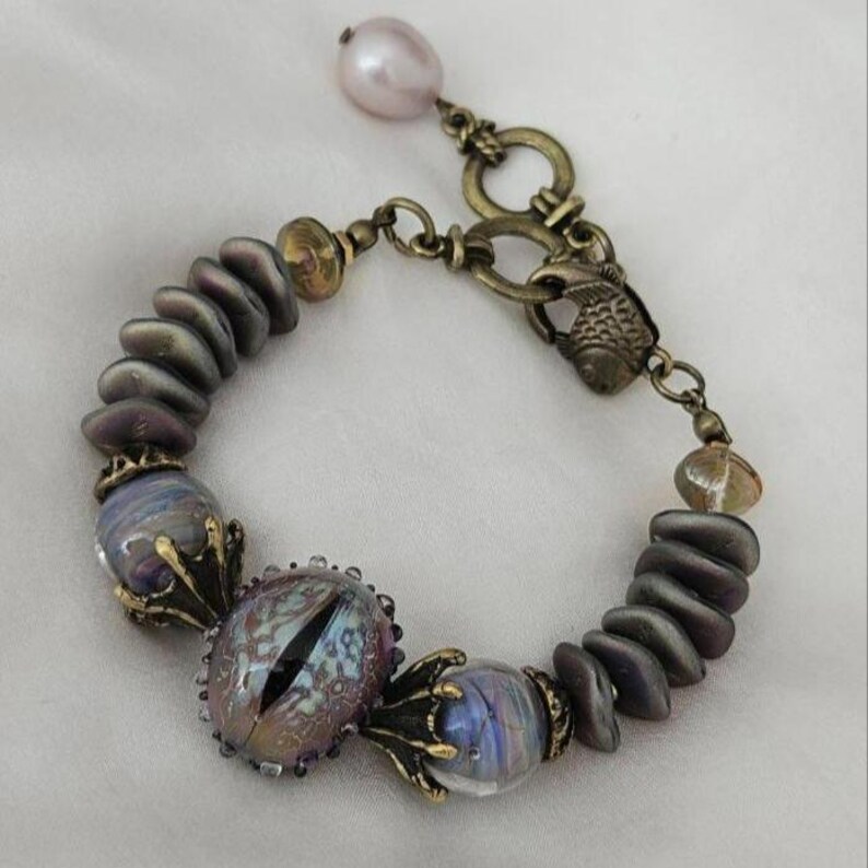 Handcrafted Gothic Snake Eye Bracelet - Artisan Lampwork Glass Fantasy Jewelry for Magic Lovers & Cosplay image 1