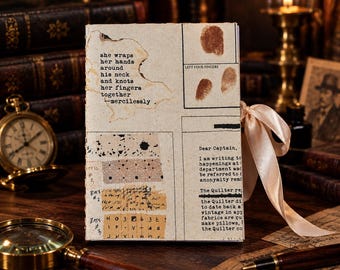 May include: A rectangular journal with a cream-colored cover featuring printed text, ink splatters, and brown fingerprint graphics. The cover includes the phrase she wraps her hands around his neck and knots her fingers together--mercilessly. A light pink ribbon is tied to the side.