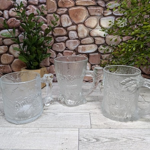 Set of three vintage Flintstones McDonald&#39;s glass mugs
