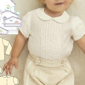 May include: A sewing pattern for a baby shirt with a Peter Pan collar. The pattern includes five sizes for babies aged 3 to 24 months. The pattern is printed on white paper with black lines. The image also shows a baby wearing a white shirt with a Peter Pan collar.