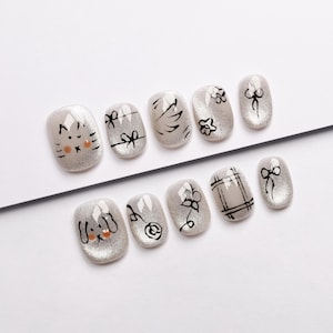 Sketchbook Charm: Hand-Drawn Designs on Silver Press On Nails/kawaii nails/anime nails/hand painted nails/cat eye nails#034