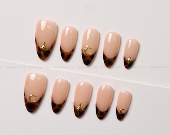 Tortoiseshell French Tip Press On Nails with Gold Moon and Star Accents
