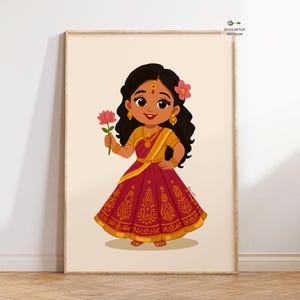 Puede incluir: Ilustración enmarcada de una niña de dibujos animados con un atuendo tradicional indio. Lleva un vestido rojo y dorado, joyas doradas y una flor rosa en el pelo. Sostiene una flor de loto rosa. La obra de arte es de Divya Natur Art Shop.