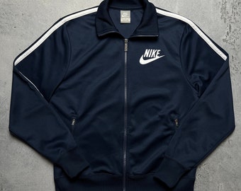 Veste zippée vintage Nike avec logo virgule centrale des années 90