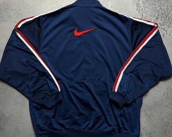 Veste zippée vintage Nike avec logo virgule centrale des années 90