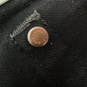 Calça jeans skinny stretch preta Acne Studios River Stay, fabricada na Itália. imagem 11