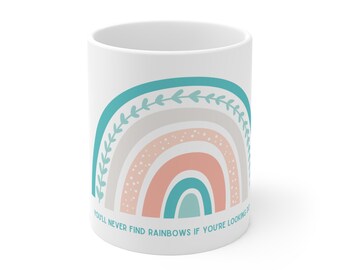 You'll never find rainbows if you're looking down - mug