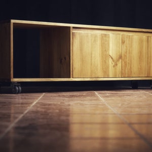 Handcrafted Pine Wood Media Console: Minimalist TV Unit with Wheels