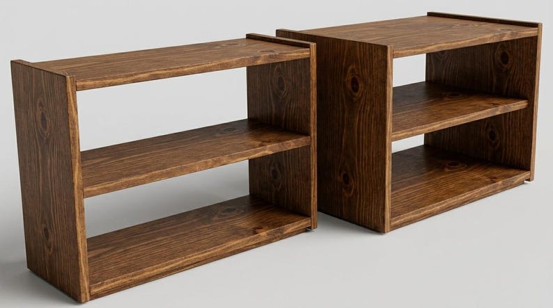 May include: Two rectangular wooden shelving units featuring a dark brown finish with visible wood grain and knots. Each unit consists of three horizontal shelves supported by two vertical side panels, providing an open storage structure.