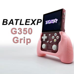May include: A pink handheld gaming console with a screen displaying the text "BATLEXP" and a pink grip. The console has a white button layout with the letters "X", "Y", "A", and "B".