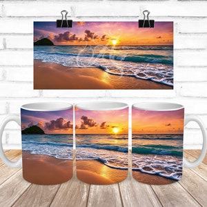 May include: Three white ceramic mugs with a sunset beach scene printed on them. The scene features a sandy beach, blue ocean water, and a colorful sunset sky with clouds.