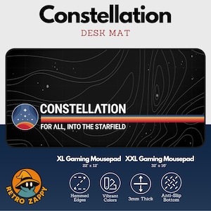 May include: Black desk mat with a constellation design. The mat features the word "Constellation" in large white letters, with the text "For All, Into The Starfield" below. Available in XL (56 cm x 30 cm) and XXL (81 cm x 41 cm) sizes.
